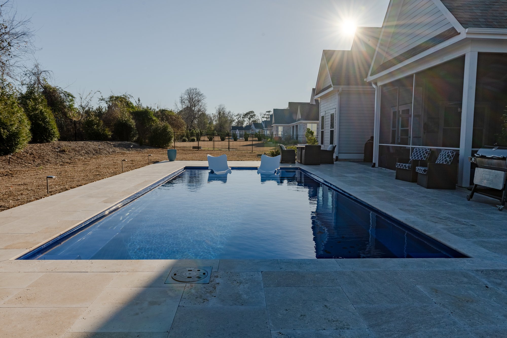 A beautifully designed residential inground pool by Sunrise Pools. A beautifully designed residential inground pool by Sunrise Pools.